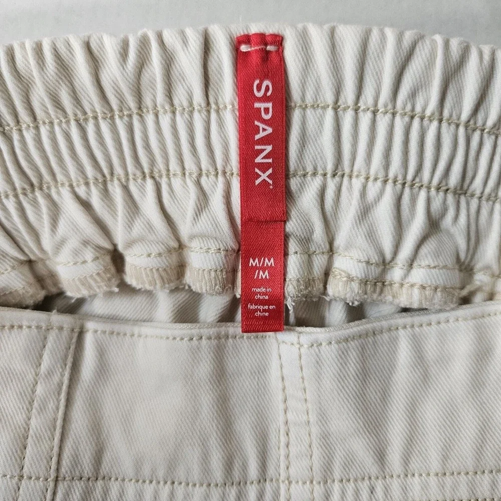 SPANX Jeans Women's M 28x29.5 Stretch Twill Cargo‎ Ivory Pockets Hem Zip Joggers